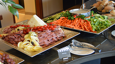 Meat, cheese, vegetable and fruit plates.