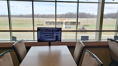 Harlan's Holiday Seating Area Harlans Holiday overlooking racetrack